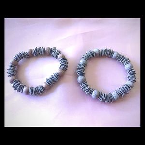 Two ring bracelets with sparkly beads